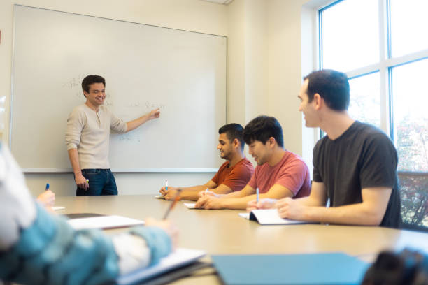 istock Med Student Tutor - University Students in Conference Room Learning Medicine - Small Group Teaching - Study Room - Med Student 1442094873