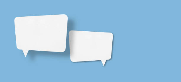 istock white paper with speech bubbles isolated on blue background communication bubbles 1442100436