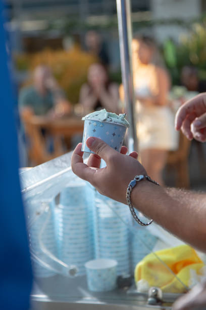 hand ice cream cup