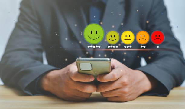 istock Businessman pressing smiling emoji on virtual touch screen-customer service and satisfaction concept 1442102154
