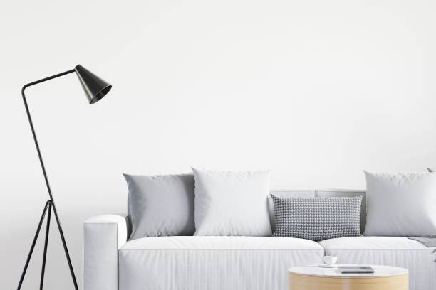 istock 3D of white living room design with sofa and a lamp - interior design with copyspace 1442102277