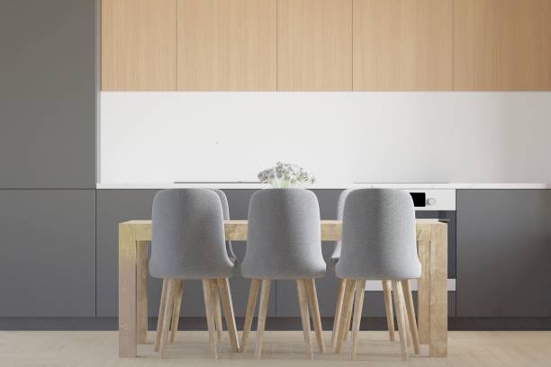 istock 3D of minimalistic kitchen table with chairs - interior design with copyspace 1442102302