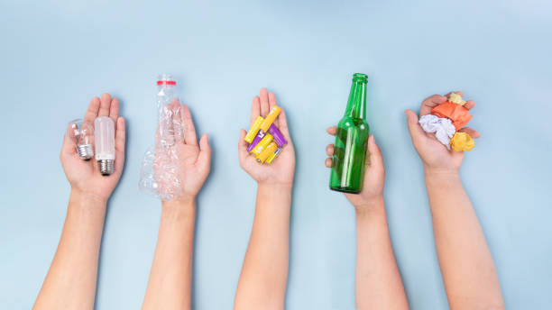 istock Five types of garbage in human hands - sorting, recycling waste concept 1442102905