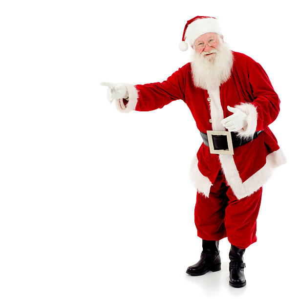 Santa pointing Santa Claus standing, full length, pointing to copy space, white background directing photos stock pictures, royalty-free photos & images