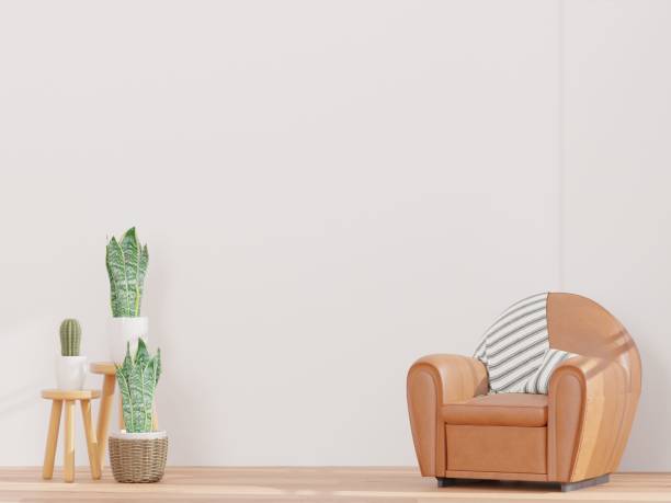 istock 3D rendering of a Living room and white wall with brown leather sofas - great for a background 1442107384