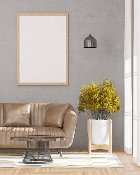 istock 3d rendering of a loft-style living room with a concrete wall, sofa,  mockup frame, and plants. 1442108457