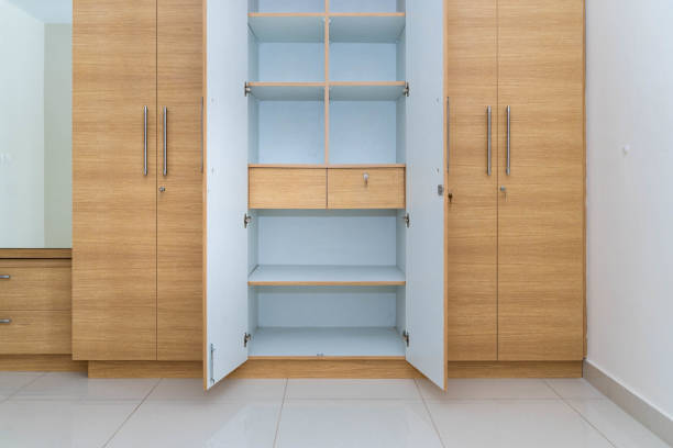 istock Wooden wardrobe with open doors and shel 1442108558
