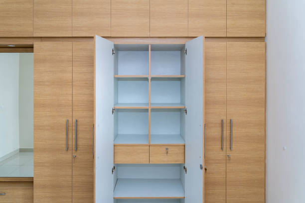 istock Wooden wardrobe with open doors and shelves 1442108563