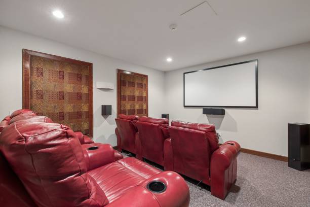 istock Cozy cinema room with red couches in a mansion 1442109621
