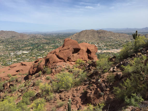 istock Rocky boulder on the Camelback mountain under a blue cloudy sky in Pheonix, Arizona 1442110869
