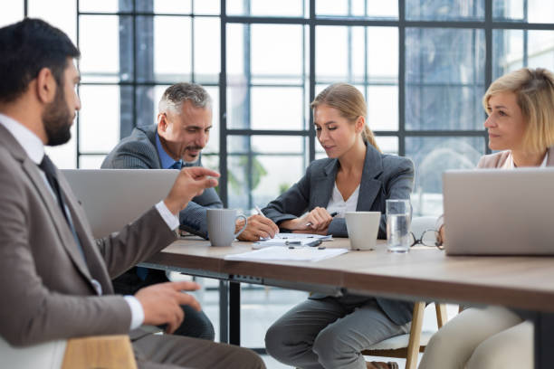 istock Business meeting - manager discussing work with his colleagues. 1442111113