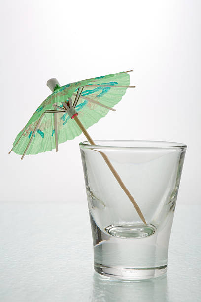 Cocktail umbrella on a white background