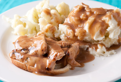 open faced hot chicken sandwich with mashed potatoes