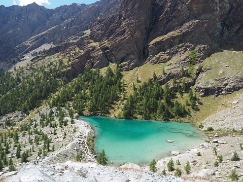 Aerial shot of the blue lake in Aosta valley, Champoluc, Italy - Lago Blu