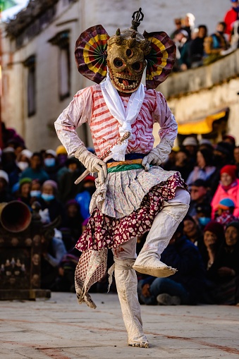 Lo Mant, Nepal – May 28, 2022: Tibetan Buddhist in traditional demon ghost clothing in Ritual Dance at the Tiji Festival in Upper Mustang, Nepal.