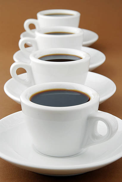 expresso row - stimulated coffee espresso addiction photos et images de collection