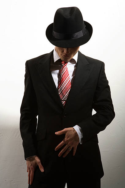 the dancer in suite and hat