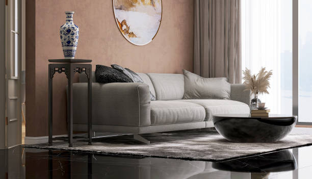 istock Gray colored fabric sofa, coffee table, Chinese style side table and ceramic vase in modern and luxury brown wall and black marble floor living room with rug with sunlight from window sheer curtain 1442113531
