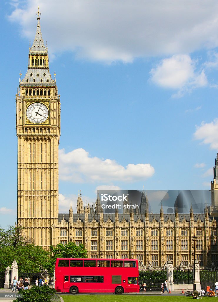 Portrait of Big Ben in London, with red bus Big Ben - famous clock and London landmark.  Big Ben Stock Photo