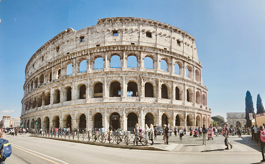 Rome, Italy – May 05, 2017: The Roman Colosseum, Rome, Italy with clear blue sky. Roman landmark and ancient architecture.