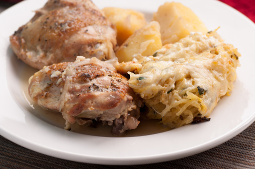 chicken thighs with baked squash gratin and potatoes