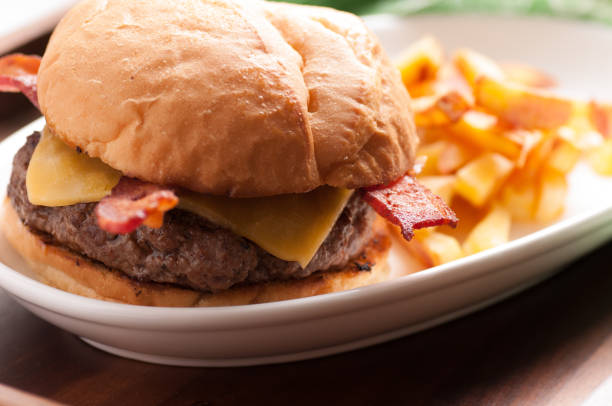 istock bacon cheeseburger with hand cut fries 1442120538