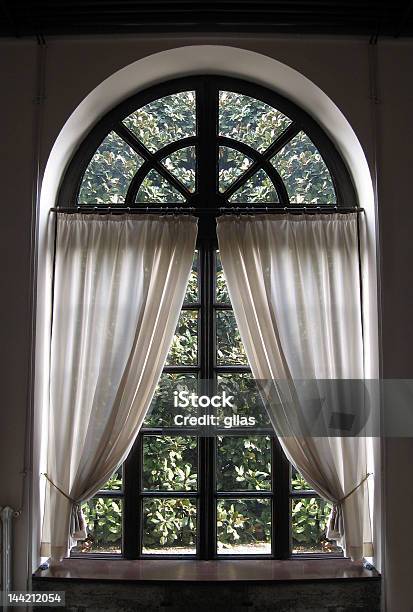Classical Window With Drapes Halfway Drawn Open Stock Photo - Download Image Now - Arch - Architectural Feature, Architecture, Cityscape