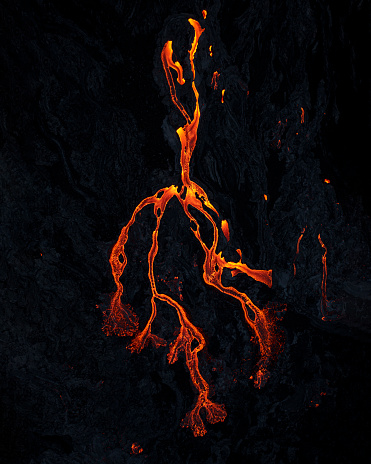 A vertical shot of lava rivers from the active volcano