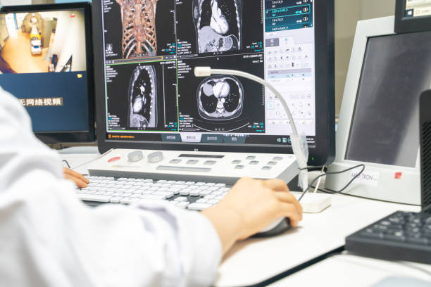 istock Doctor analyzing the test results from MRI Scanner on the computer during Covid 19 pandemic 1442123136