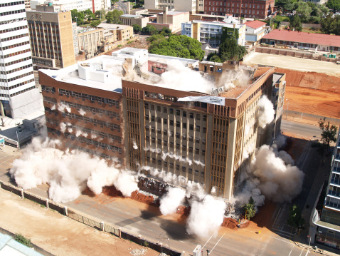 2nd in series of demolition by implosion of four buildings in one block in Johannesburg to clear the way for a new parking lot for the new Gautrain underground railway line     