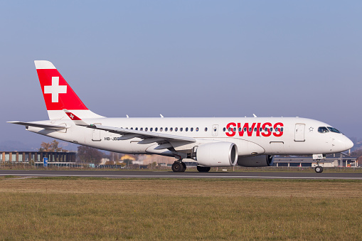 Graz, Austria – October 31, 2012: Swiss Airbus A220 lining up runway in Graz for departure to Zurich