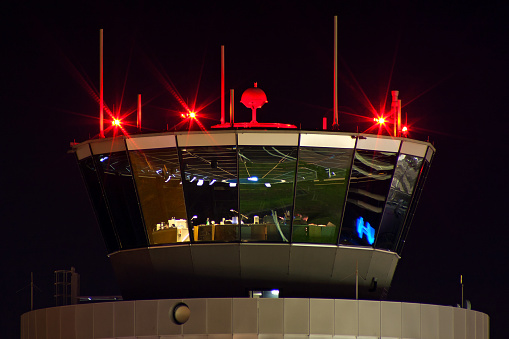 Airport air traffic control tower at night