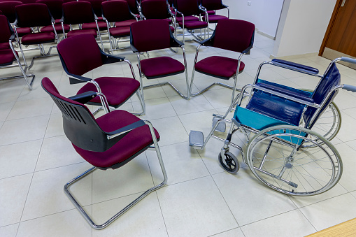 Wheelchair in an conference room