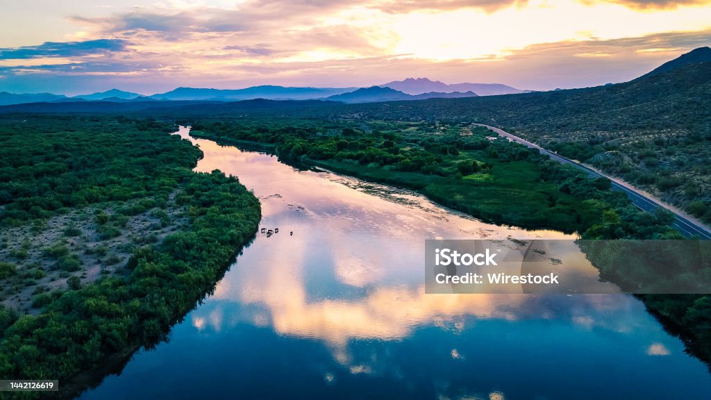 Landscape of Salt River surrounded by greenery and hills during the sunrise in Arizona A landscape of Salt River surrounded by greenery and hills during the sunrise in Arizona Arizona Stock Photo
