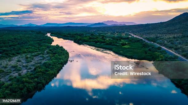 Landscape Of Salt River Surrounded By Greenery And Hills During The Sunrise In Arizona Stock Photo - Download Image Now