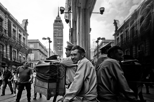 CDMX, Mexico – October 14, 2019: A grayscale of two male musicians outdoors, Mexico City