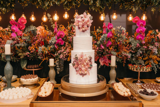 istock Beautiful wedding cake, sweets, and decorative flowers; festive decor 1442126936