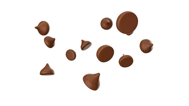 istock Scattering of tasty chocolate chips on white background Chocolate 1442126938
