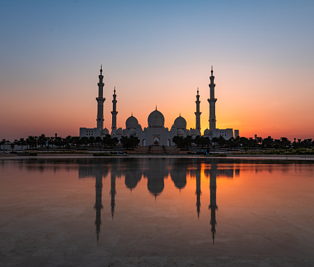 Abu Dhabi, United Arab Emirates – September 24, 2021: Sheikh Zayed Grand Mosque, Abu Dhabi at sunset as taken from Wahat AlKarama
