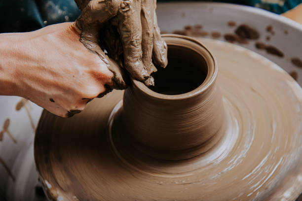 istock Woman hands working and making pottery 1442131760