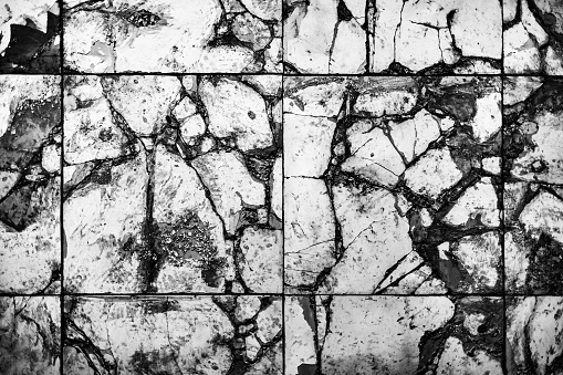 Shattered square floor tiles
