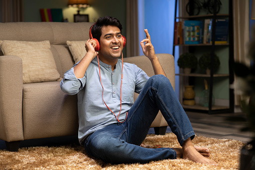 Portrait of Indian young man at home