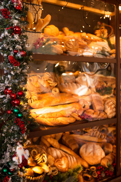 Christmas bakery showcase and Christmas garland. Vertical image