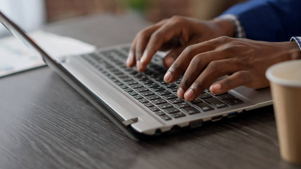 istock Company manager working with project information on laptop 1442146862