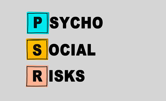 PSR - PsychoSocial Risks abbreviation on gray background. Business concept. Multi colored square sticky notes on gray background, top view