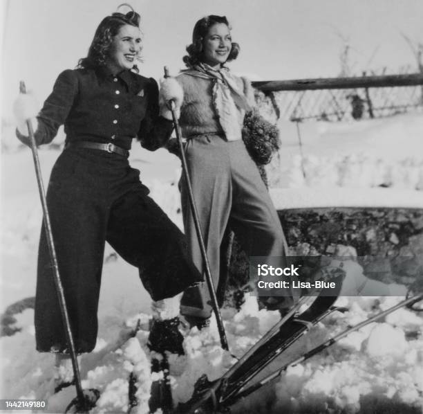 Young Women Skiing In The Mountains 1935 Stock Photo - Download Image Now - Retro Style, Archival, Old-fashioned