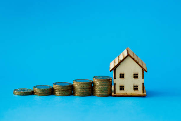 istock Saving money to buy a house 1442149585