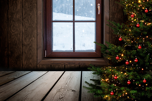 Open window at Christmas with Christmas tree