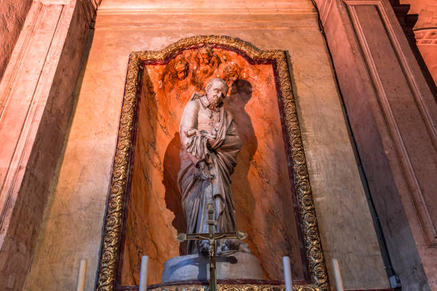 Paris, france, october 20, 2022 : Saint vincent de paul statue by Nicolas Legendre, 17th century, in  Saint nicolas du chardonnet church, in Paris, France