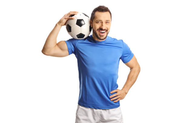 istock Fotball player holding a ball on his shoulder 1442155257